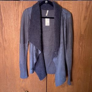 Grey faux fur and suede sweater. NWT.